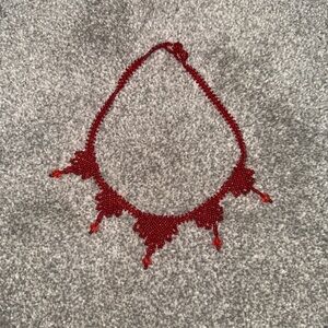 Red choker necklace